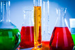 Foto: test tubes with colorful liquids test tubes with colorful liquids