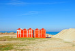 old wooden cabins on the sand near the sea in rimini, italy