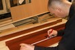 a man is measured by underground wooden boards