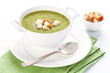 Broccoli soup with croutons on white background
