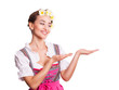 attraktive junge Frau im Dirndl mit Offener-Hand-Geste