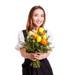 attraktive junge Frau im Dirndl mit Blumenstrauss