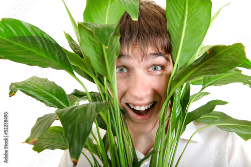 Photo: Surprised Young Man in Leaves Surprised Young Man in Leaves