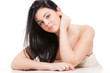 Brunette woman with long healthy hairs on white isolated backgro
