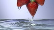 Fresh strawberry under water with a splash. 
