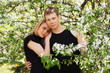 Happy young couple in a spring garden