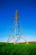 power lines steel construction against blue sky