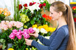 Photo: Female florist in flower shop Female florist in flower shop