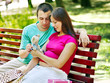 Photo: Pregnant woman with man outdoor. Pregnant woman with man outdoor.