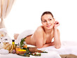 Woman getting spa treatment outdoor.