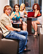 Group people with tablet computer.