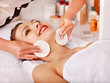 Foto: Woman getting facial massage . Woman getting facial massage .