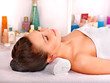 Woman getting  facial massage .