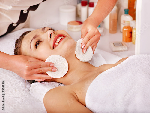Photo: Woman getting facial massage . Woman getting facial massage .