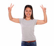 Photo: Happy smiling young woman celebrating a victory Happy smiling young woman celebrating a victory