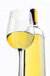 White wine glass and bottle