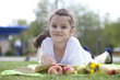 Photo: Portrait of beautiful little girl in spring blossom Portrait of beautiful little girl in spring blossom