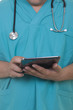 Doctor working on a digital tablet