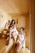 Young woman in the sauna