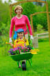 Photo: Gardening, planting - girl helping mother in the garden Gardening, planting - girl helping mother in the garden
