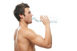 portrait of young man drinking water