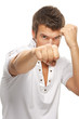 close-up portrait of young man holding fists