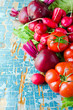 Fresh vegetables on the wooden background
