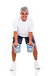 Photo: senior man working out with kettle bells senior man working out with kettle bells