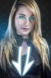 Sexy young woman with blue neon lights, future warrior costume,