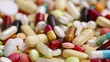 Many different pills turning