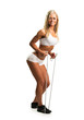 Young woman with skipping rope isolated on white