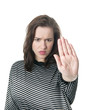 junge Frau zeigt stopp