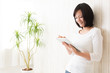 beautiful asian woman using tablet computer