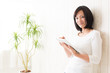 beautiful asian woman using tablet computer