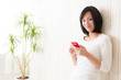 beautiful asian woman using smart phone