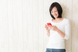 beautiful asian woman using smart phone
