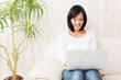 beautiful asian woman using laptop computer