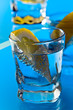 Photo: gin with lemon on a glass table gin with lemon on a glass table