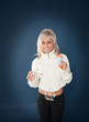 Beautiful woman blowing soap bubbles