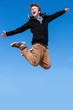 Photo: Jumping boy shouting. Jumping boy shouting.