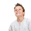Smiling boy looking up.