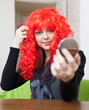 Woman in red periwig