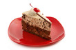 Chocolate cake on red dish