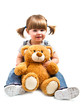 bambina sorridente con orsacchiotto