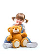 bambina sorridente con orsacchiotto