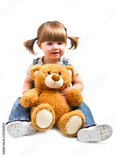 Photo: bambina sorridente con orsacchiotto bambina sorridente con orsacchiotto