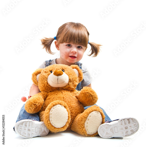 Photo: bambina sorridente con orsacchiotto bambina sorridente con orsacchiotto