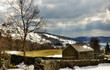 Stone built barn in winter