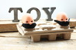 Two toys with moustaches