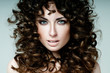 Foto: beautiful brunette with curly hair beautiful brunette with curly hair
